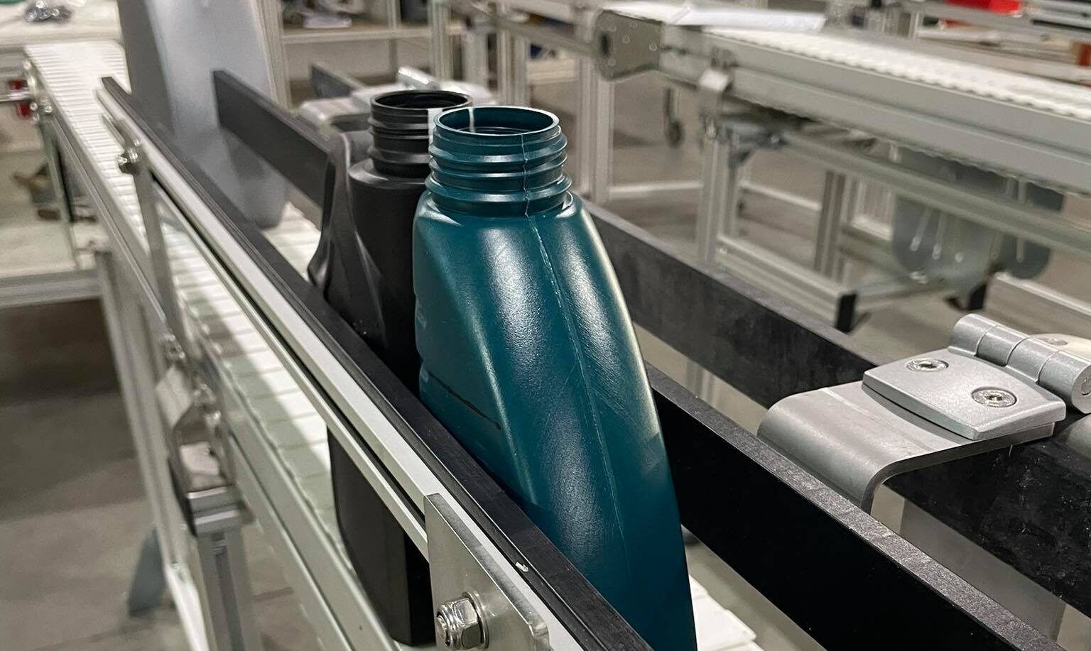 This is an example of a conveyor, transporting diversified products such as bottles.