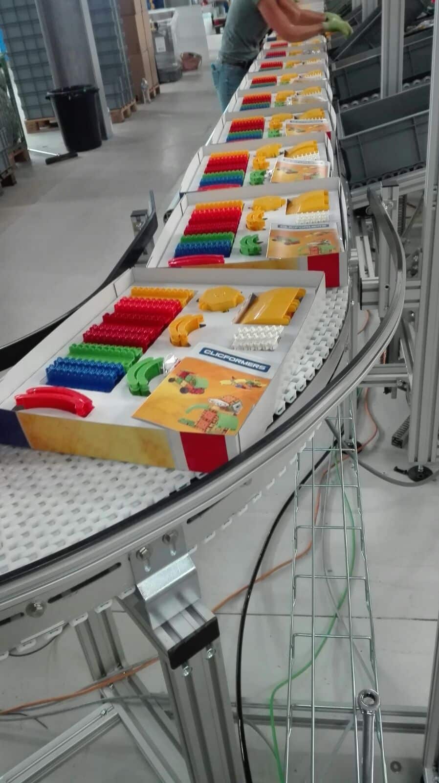 Our conveyor belts for manufacturing and packaging. This conveyor system is used for packing kids' toys.